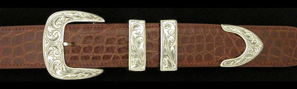 #0884 ENGRAVED CLASSIC with FRAME TIP  4 pc Buckle Set for 1 1/4" belts from $290.00 for the single buckle to $725.00 for the 4 pc set.